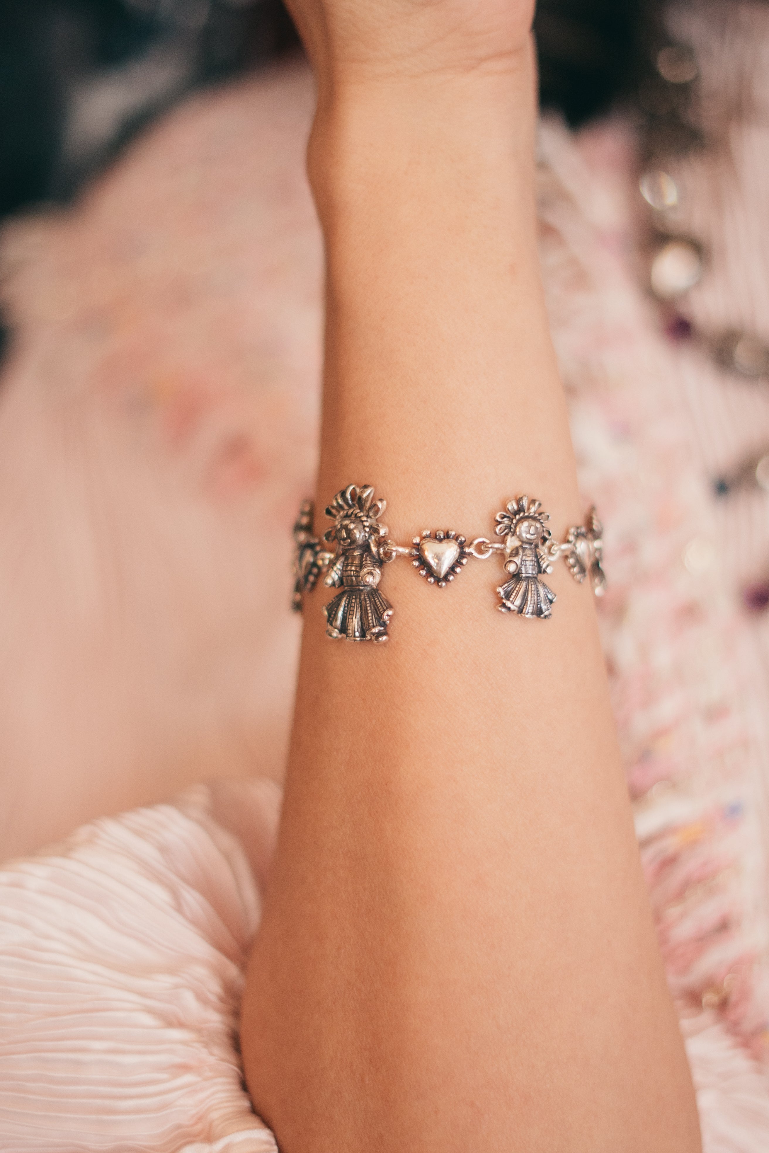 Pulsera Cinco Muñequitas