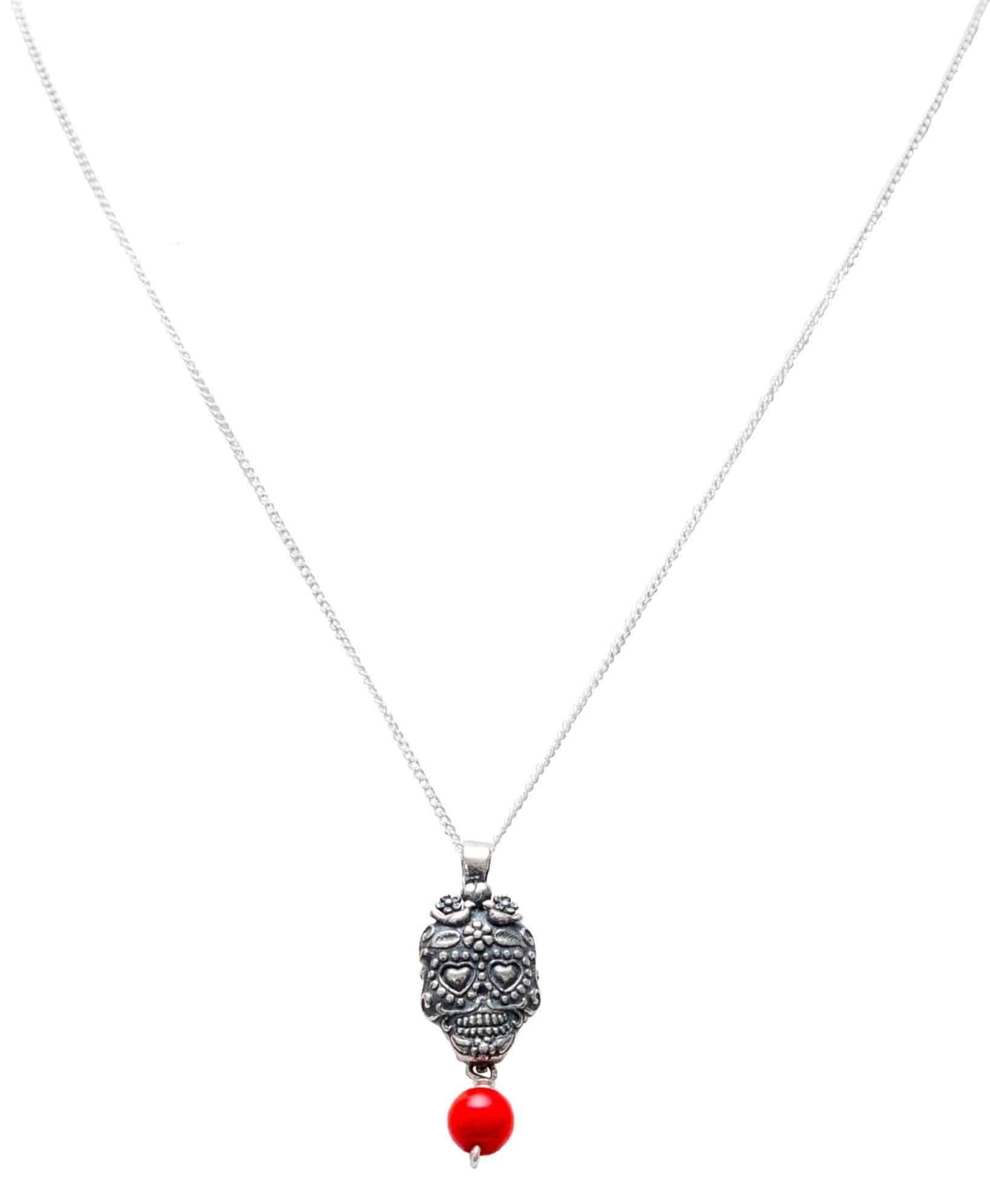 Dije calavera ojos corazón coral Gabriela Sánchez Dije