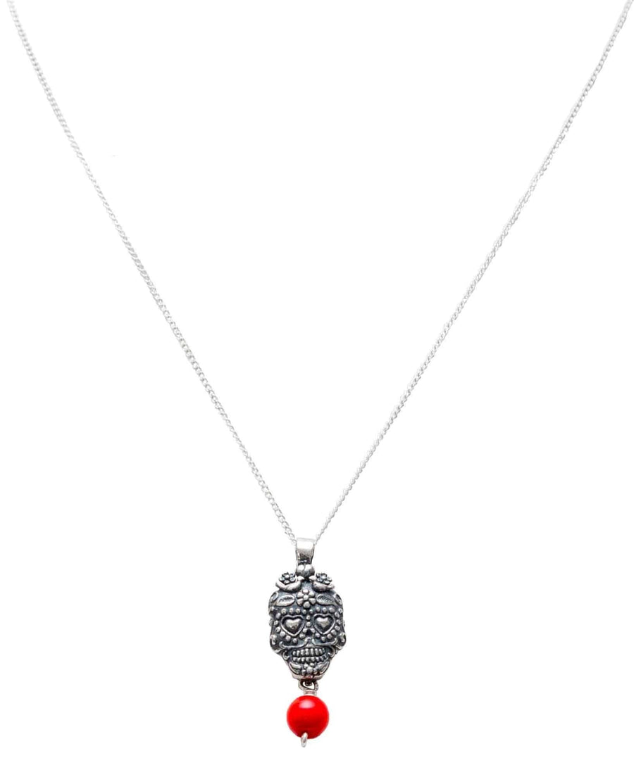 Dije calavera ojos corazón coral Gabriela Sánchez Dije